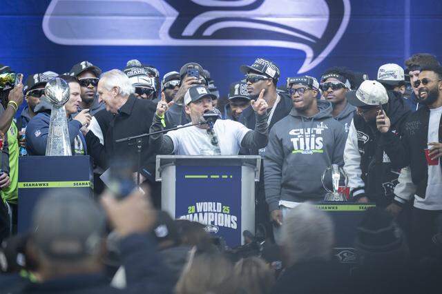 Seahawks general manager John Schneider speaks to the crowd at the team’s Trophy Celebration event at Lumen Field on Wednesday, Feb. 11, 2026, in Seattle.